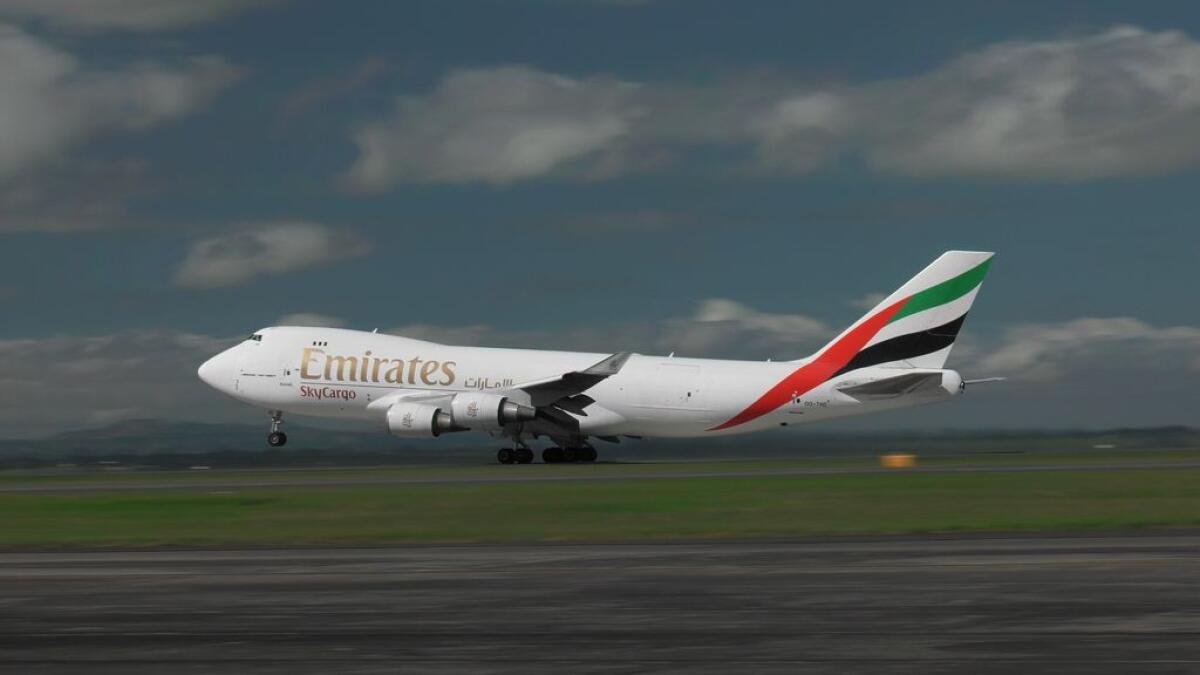 Video: Emirates plane flies boat across the world
