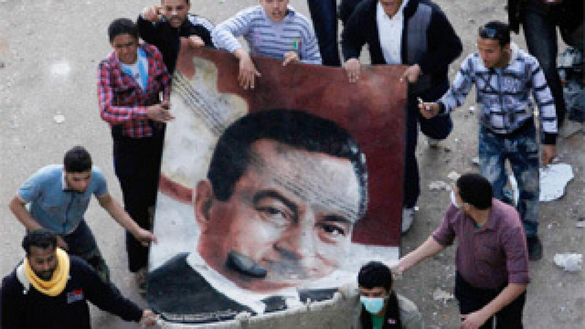 Egypt’s Mubarak defies demands