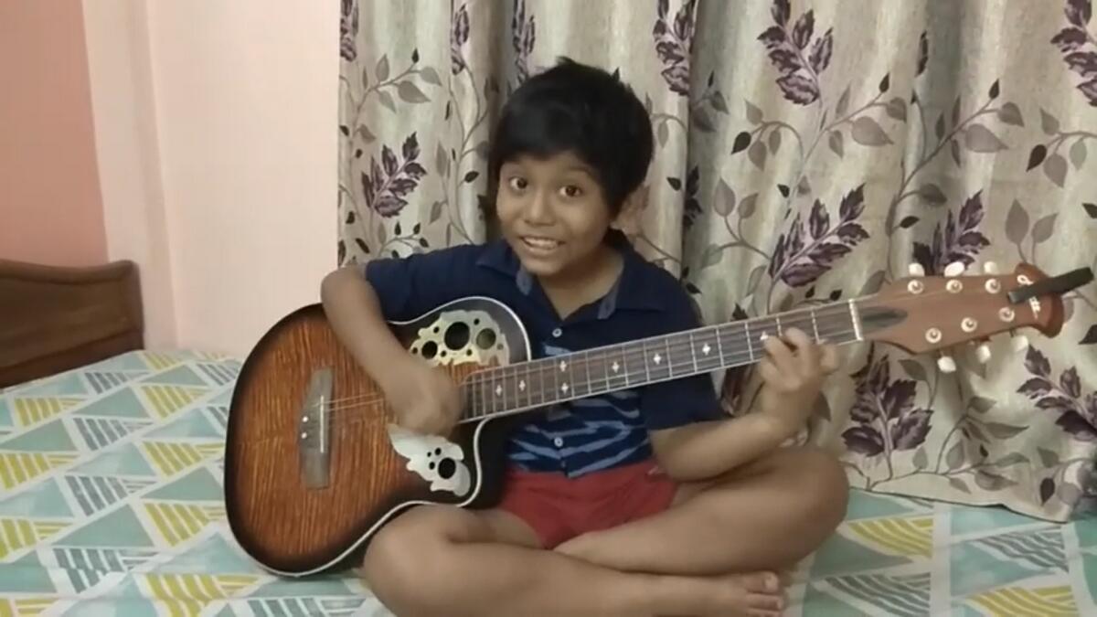 India, Indians, boy, singing, guitar, coronavirus, lockdown, social media, videos, Rishav De