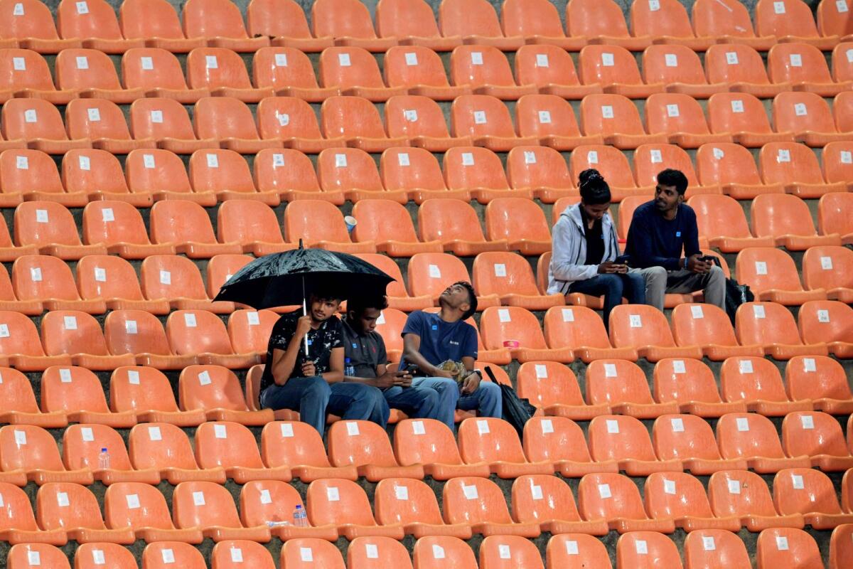 Fans during the rain-hit Asia Cup match between India and Pakistan at the Pallekele International Cricket Stadium in Kandy. — AFP
