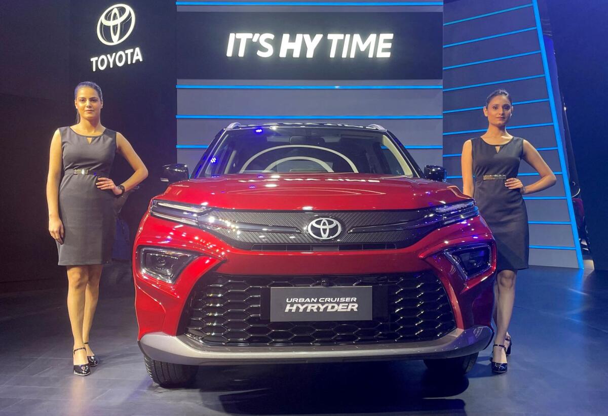 Models pose at the unveiling of Toyota's new hybrid SUV Urban Cruiser Hyryder in New Delhi, India, on July 1, 2022.  — Reuters file