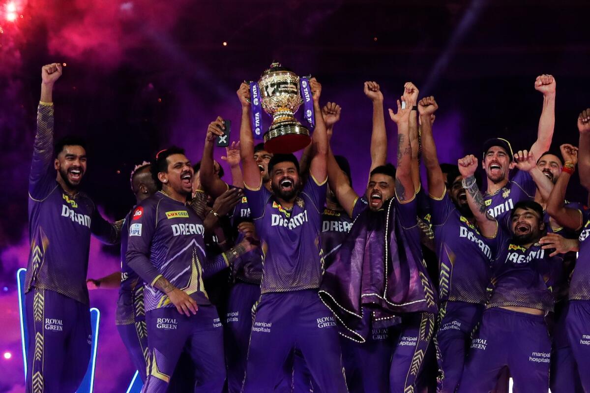 Kolkata Knight Riders celebrate with the trophy. — IPL