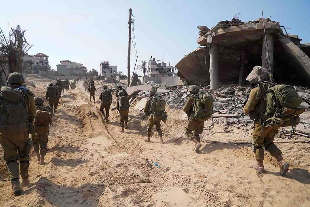 Israel troops patrolling inside the Gaza Strip as battles between Israel and the Palestinian Hamas movement continue. Photo: AFP