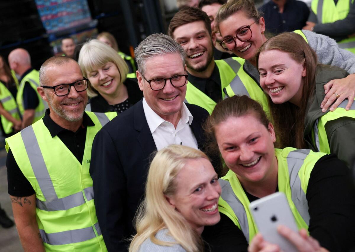 British opposition Labour Party leader Keir Starmer poses for a picture during a Labour general election campaign event,in Clay Cross, Britain, on July 2, 2024. — Reuters
