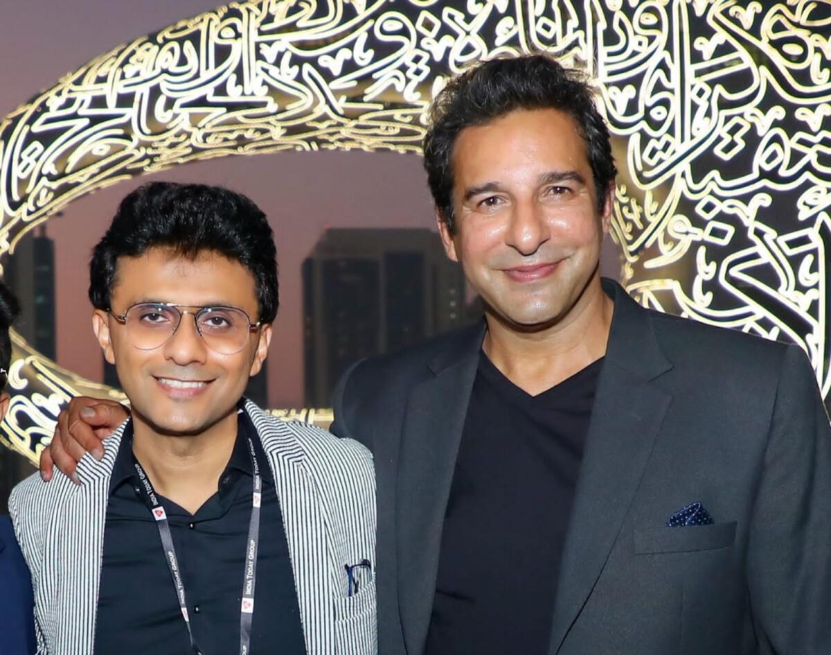 Former Pakistan captain Wasim Akram (right) with Anis Sajan.