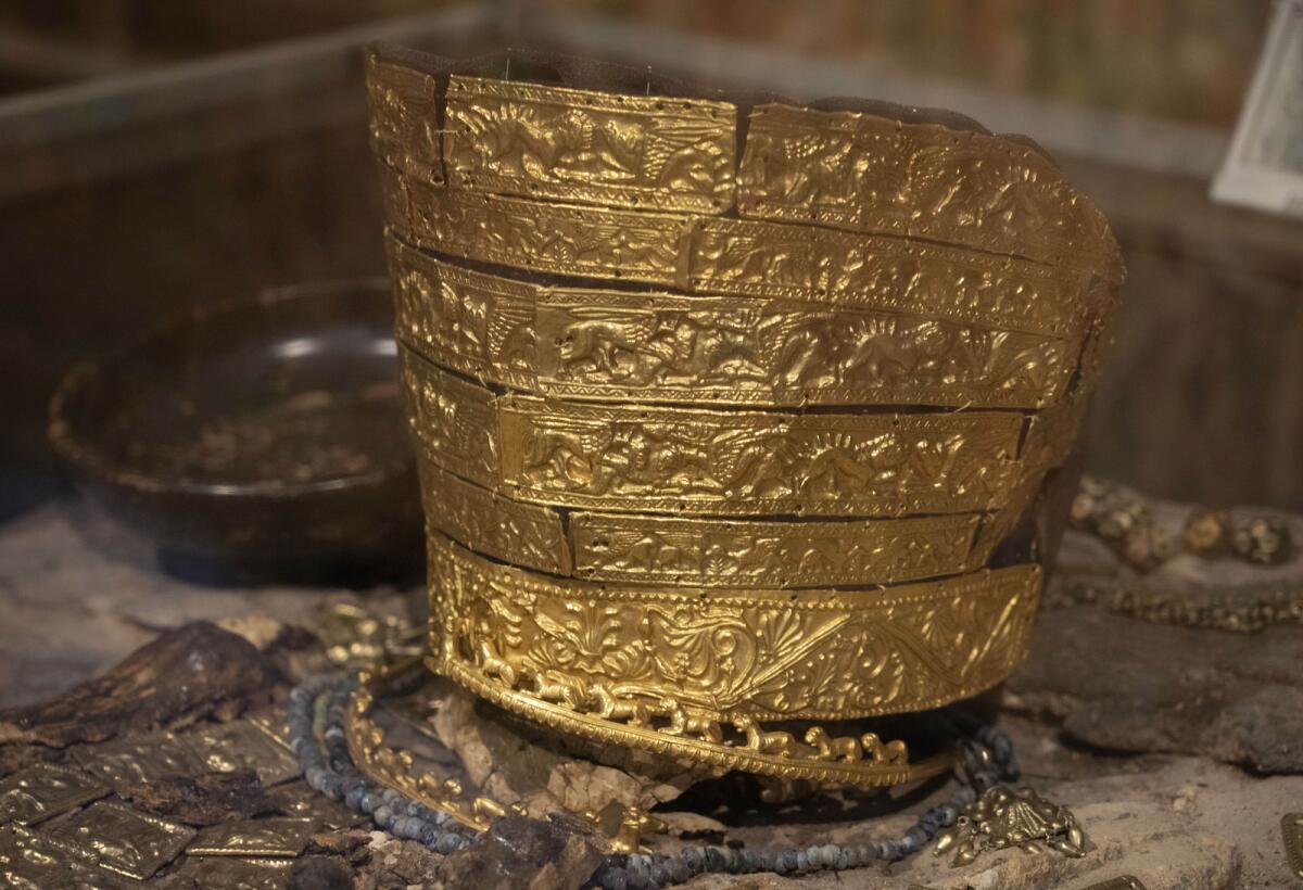 A fourth century B.C. golden ceremonial headgear, an ancient treasure from a Scythian king's burial mound, is exhibited in the Museum of Historical Treasures in Kyiv, Ukraine.