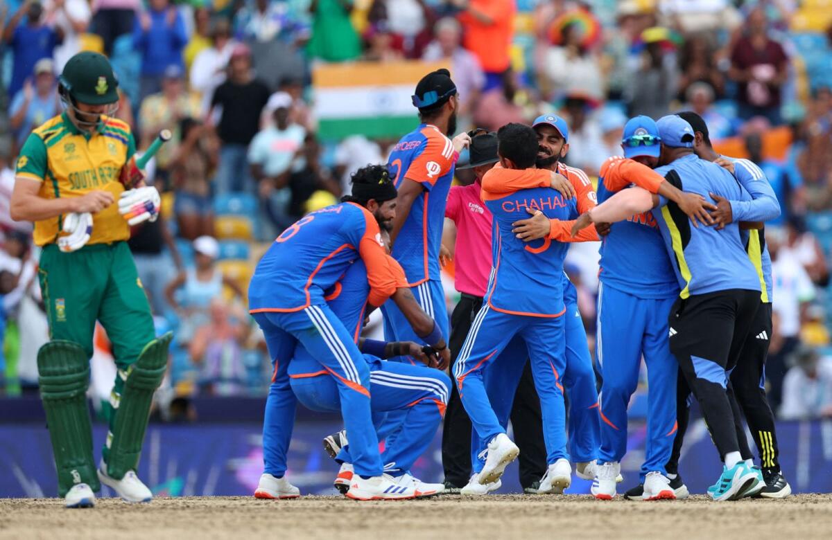 Indian players celebrate after winning the T20 World Cup. — Reuters