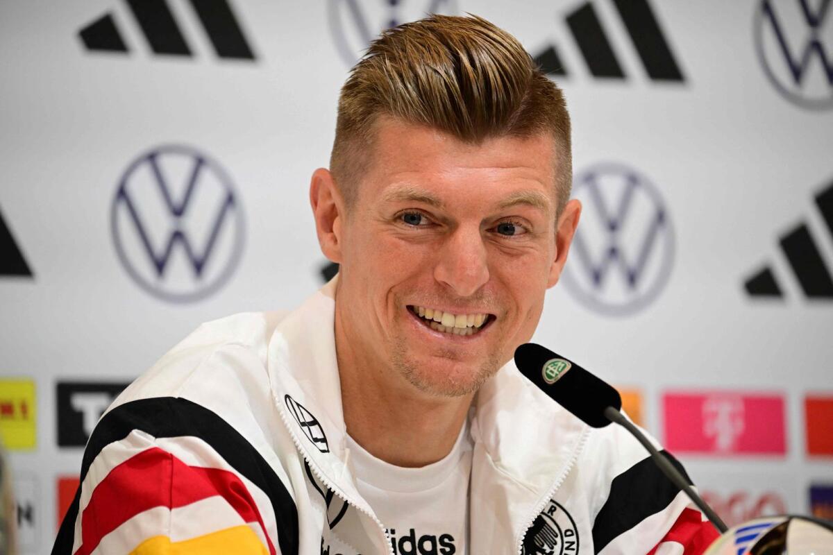 Germany's midfielder #08 Toni Kroos gives a press conference at the team's base camp in Herzogenaurach, on July 3, 2024, during the UEFA Euro 2024 football championship. (Photo by Tobias SCHWARZ / AFP)