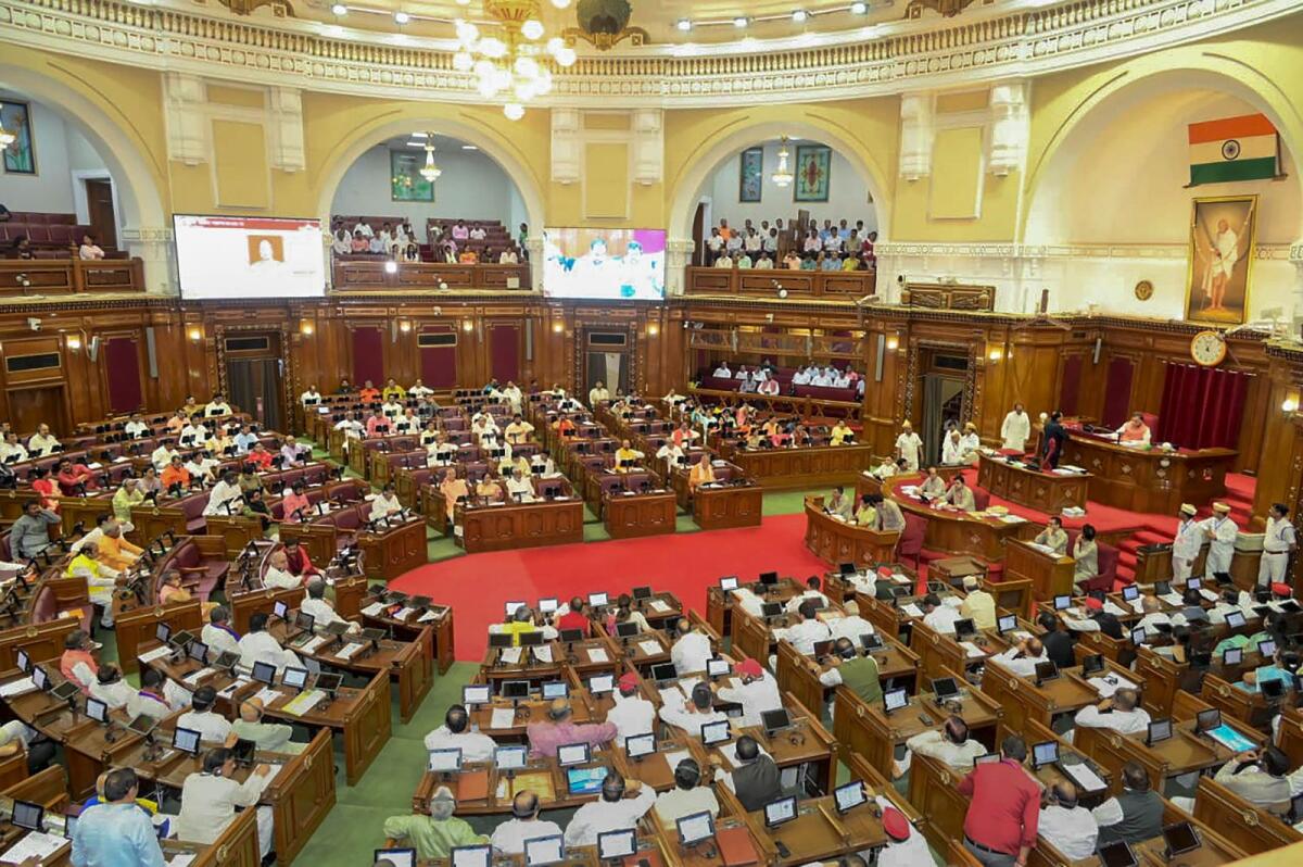 Members attend the Monsoon session of the UP Assembly at Vidhan Bhawan in Lucknow on Tuesday. Photo: PTI