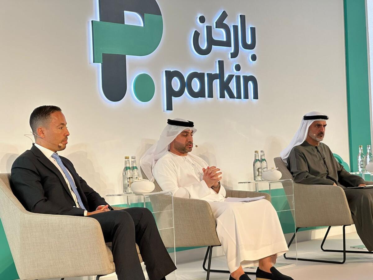 (Left to right) Parkin CFO Khattab Abu Qaoud, Parkin CEO Mohammed Al Ali, Parkin chairman Ahmed Hashem Bahrozyan. (KT Photo: Angel Tesorero)