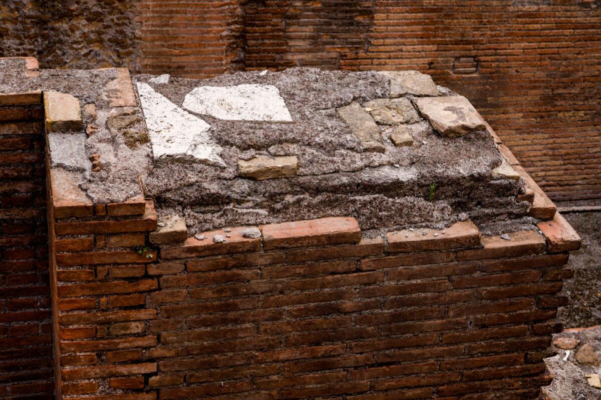 Cement surrounded by bricks is exposed in Rome's Pantheon on Monday, July 24, 2023.-- AP