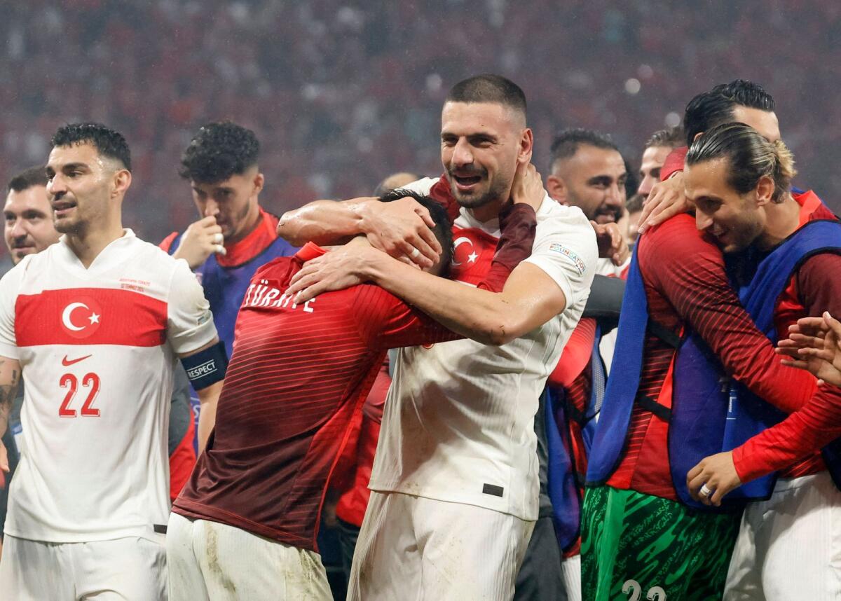 Turkey's Merih Demiral celebrates after the match. — Reuters