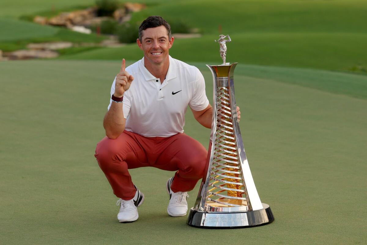 Rory McIlroy of Northern Ireland poses with the DP World Tour Championship trophy on November 20, 2022, in Dubai. — Supplied photo