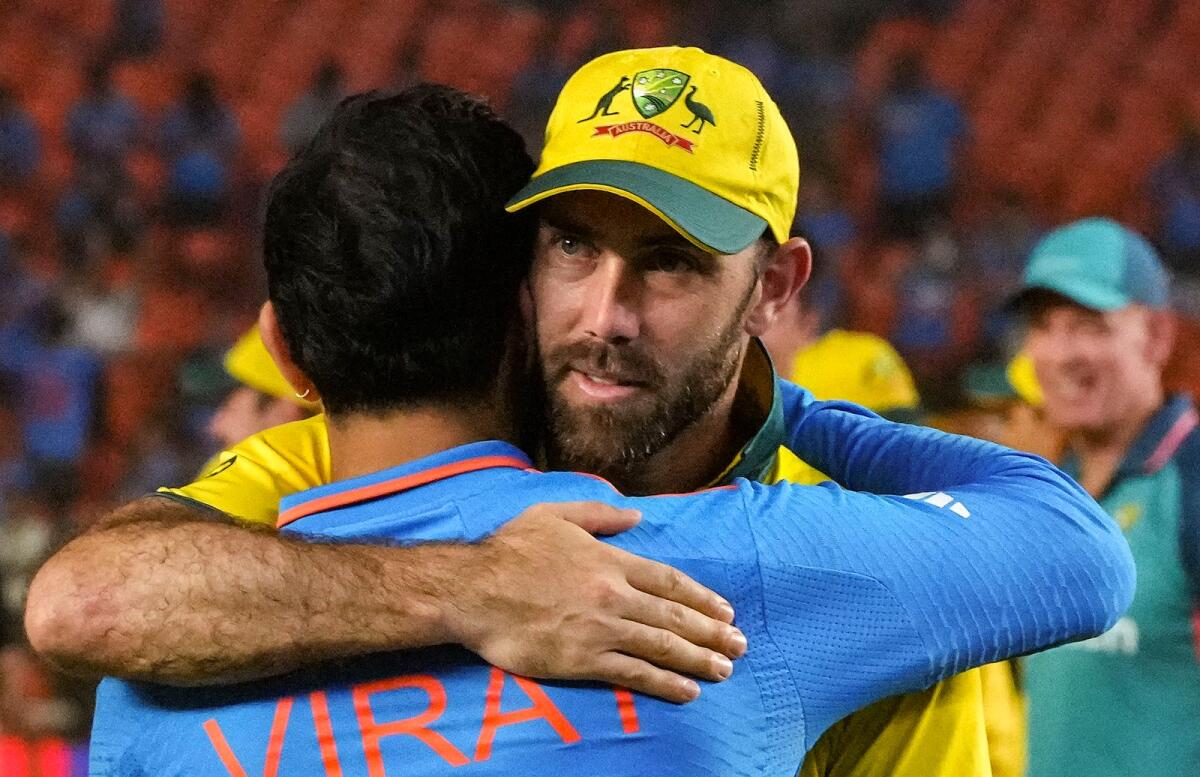 Australia's Glenn Maxwell hugs India's Virat Kohli after the final. — PTI