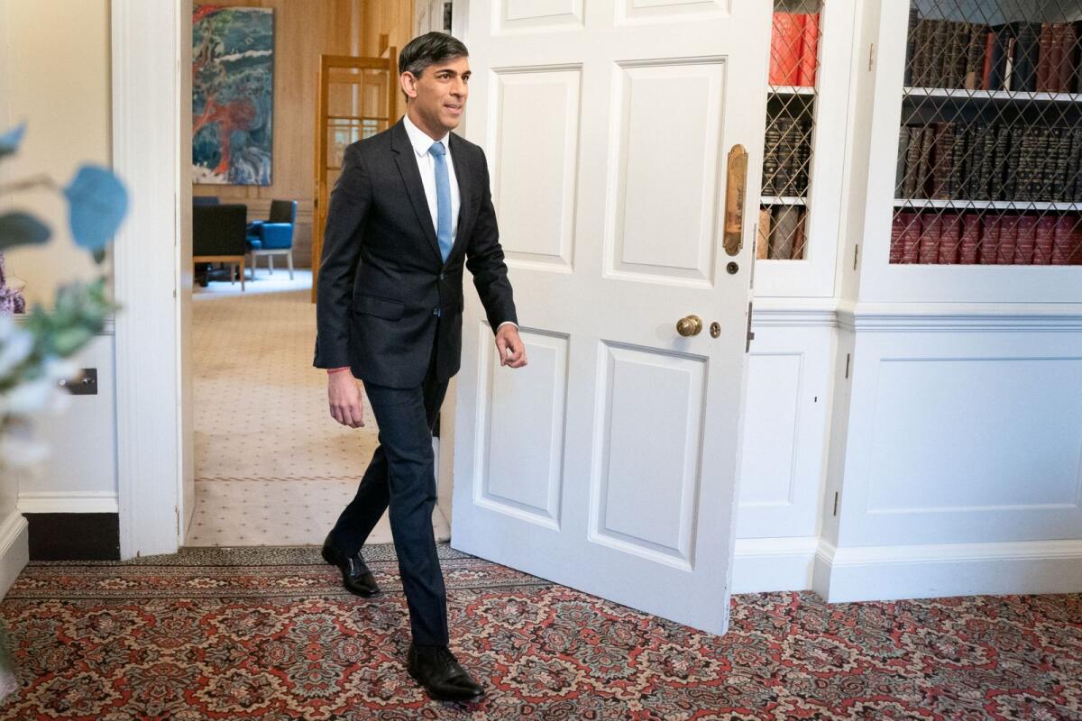 Prime Minister Rishi Sunak is pictured in 10 Downing Street in London before speaking about the latest inflation figures. — Reuters