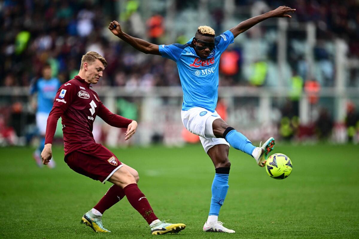 Napoli's Nigerian forward Victor Osimhen (right) has scored 25 goals in all competitions this season. — AFP