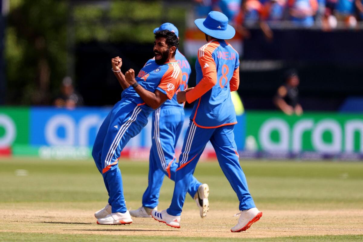 Jasprit Bumrah of India celebrates the wicket of Mohammad Rizwan of Pakistan. — AFP