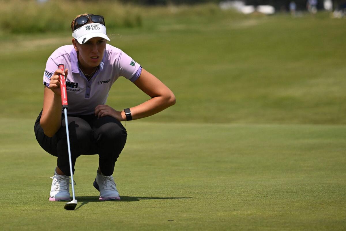 Chiara Noja of Germany lines up a putt. - AFP File