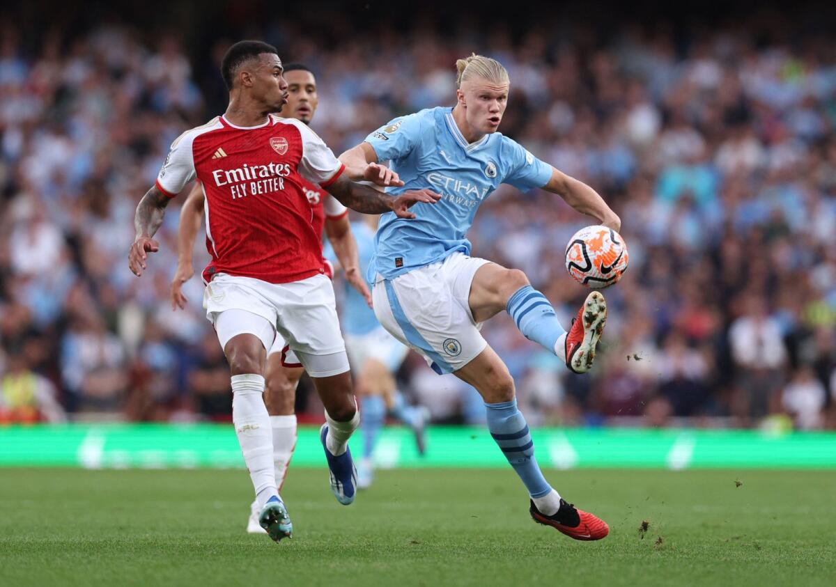 Arsenal's Gabriel challenges Manchester City's Erling Haaland in a Premier League match. - Reuters File