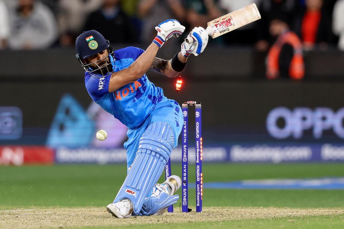 India's Virat Kohli is bowled off a free-hit ball during the ICC T20 World Cup match against Pakistan. (AFP)