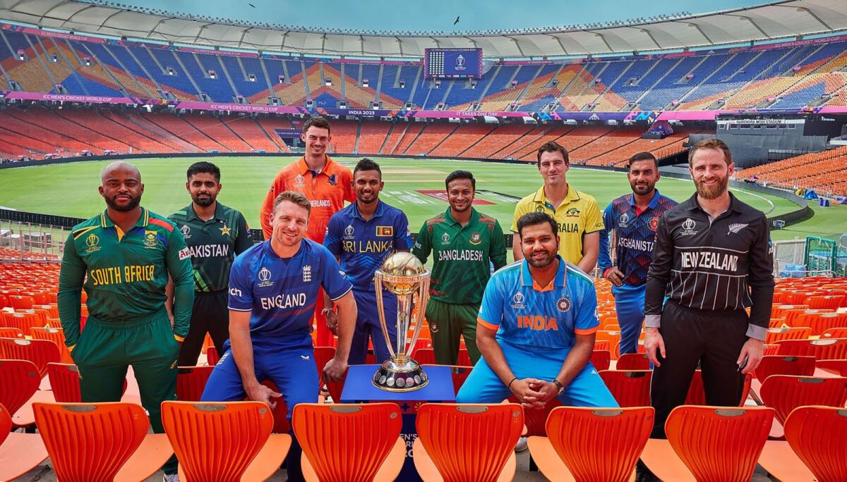 Captains of the ten participating teams in the 2023 International Cricket Council (ICC) World Cup pose with the trophy ahead of the start of the tournament. Photo: AFP