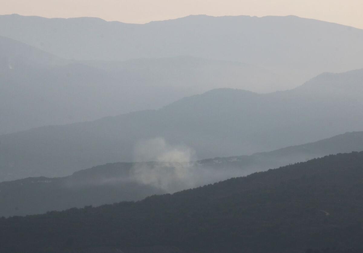 Smoke rises from the Israeli-occupied Shebaa farms area as seen from Lebanese village of Rashaya al-Foukhar, in southern Lebanon, October 8, 2023. Photo: Reuters