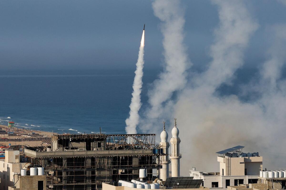 Rockets are fired by Palestinian militants into Israel, in Gaza City October 7, 2023. Reuters
