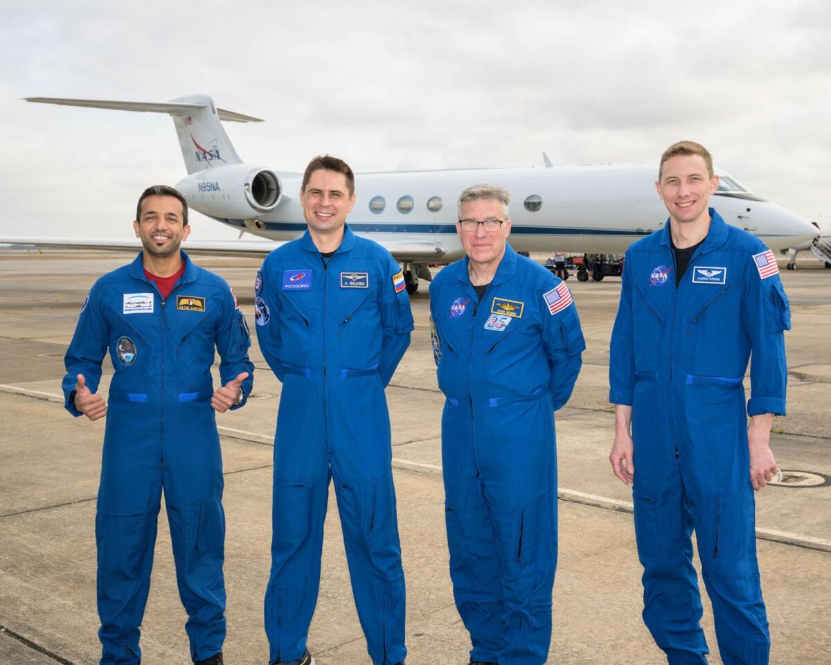 UAE astronaut Sultan AlNeyadi (L), Mission Specialist, Primary Crew, Crew-6, heading to the Kennedy Space Center, 5 days before the launch of the mission. Photo: Nasa