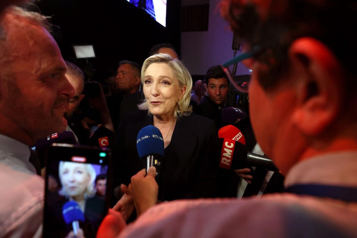 Marine Le Pen, French far-right leader and far-right Rassemblement National (National Rally - RN) party candidate, speaks to journalists in Henin-Beaumont, France, on June 30. — Reuters