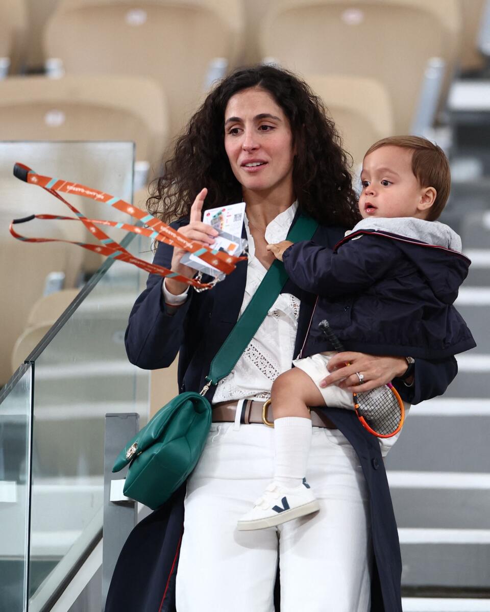 Rafael Nadal's wife Maria Francisca Perello and their son in the stands after his match. — Reuters