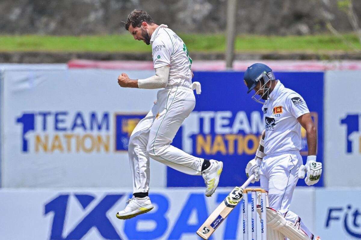Pakistan's Shaheen Afridi celebrates after taking the wicket of Sri Lanka's captain Dimuth Karunaratne. — AFP