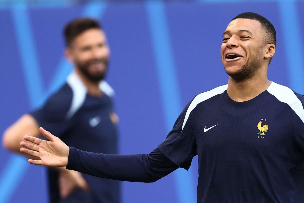 French forward Kylian Mbappe attends a training session. — AFP