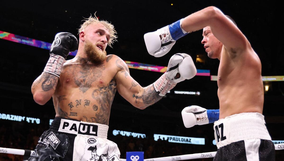 Jake Paul (left)outscored Nate Diaz in a ten-round pro boxing match at the American Airlines Center. - USA TODAY Sports