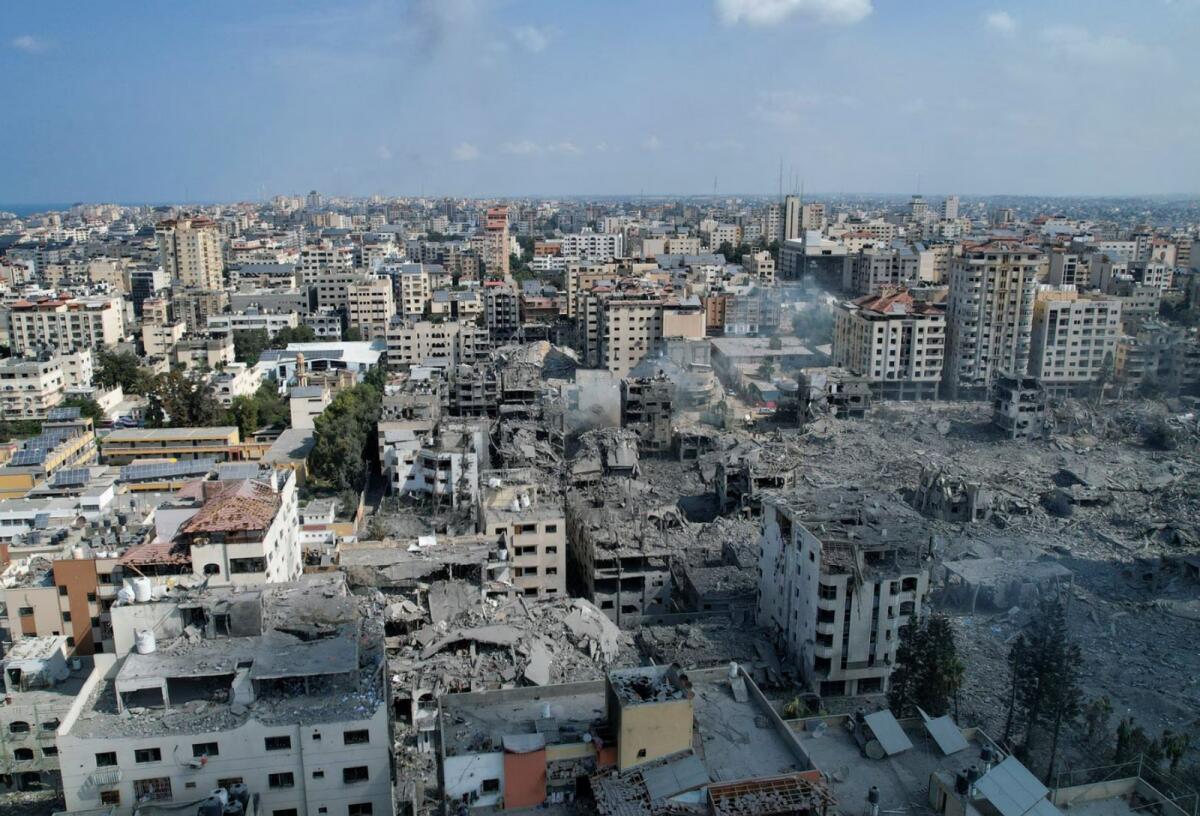 A view shows houses and buildings destroyed by Israeli strikes in Gaza City, October 10, 2023.