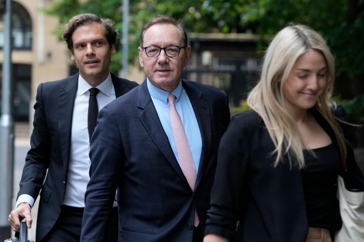 Actor Kevin Spacey (centre) arrives at Southwark Crown Court for the start of his trial in London on Wednesday. — AP