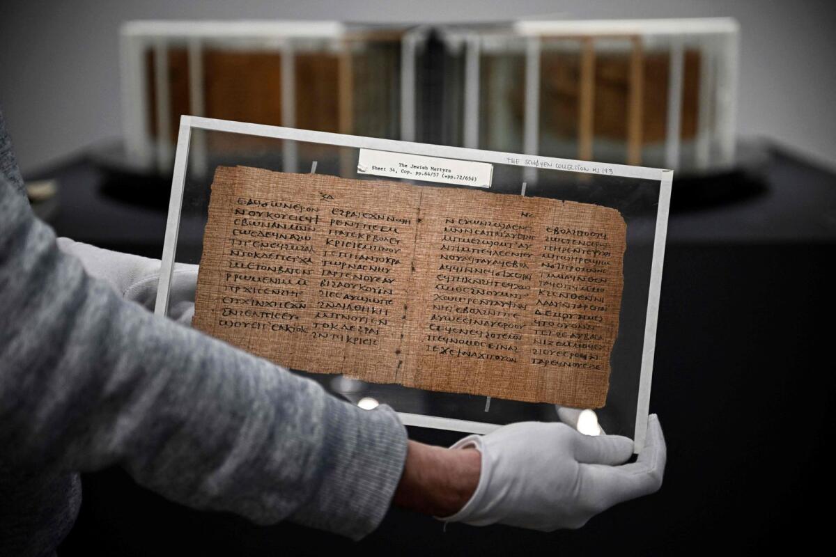 A view of The Crosby-Schoyen Codex, a Manuscript Masterpiece from The Schoyen Collection at the Christie's auction house in Paris. — AFP