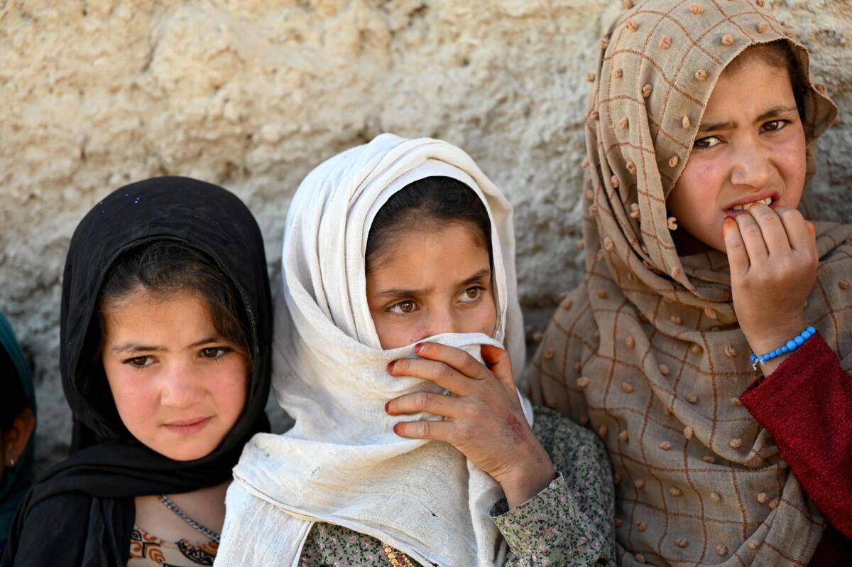 Afghan girls gather in front their house at the Nokordak village of Qarabagh district in Ghazni province on May 13, 2024. Photo is used for illustrative purposes only. — AFP