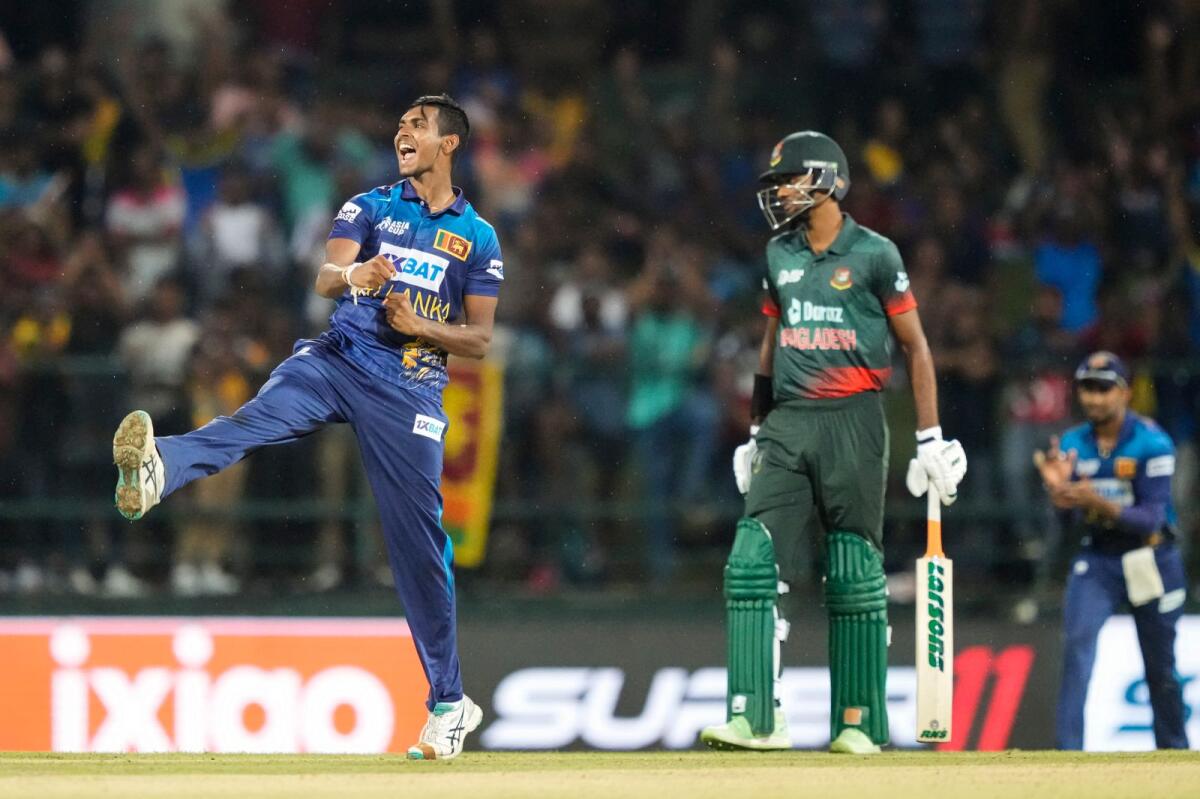 Sri Lanka's Matheesha Pathirana celebrates after taking the wicket of Bangladesh's Taskin Ahmed. — AP