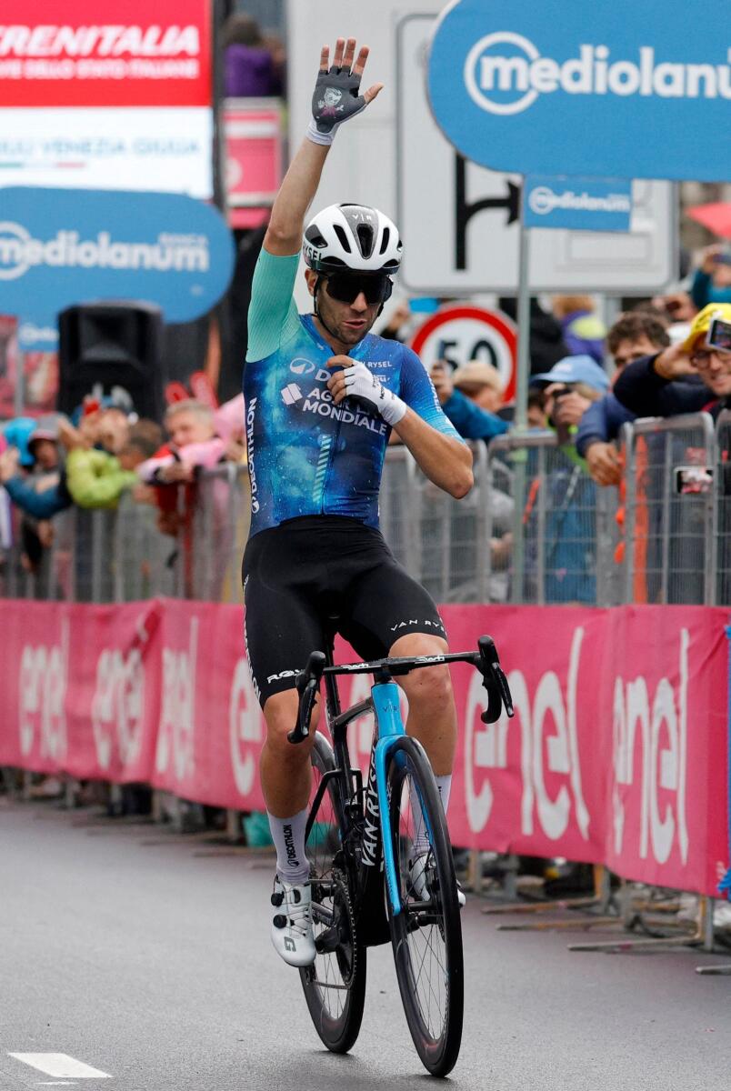 La Mondiale Team's Andrea Vendrame celebrates winning stage 19. - Reuters