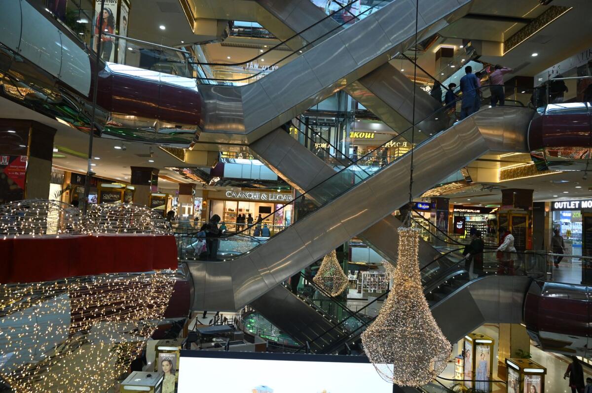 FILE. Shoppers are seen inside a shopping mall in Islamabad. Photo: AFP