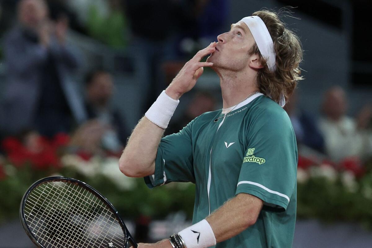 Russia's Andrey Rublev celebrates after winning against Spain's Carlos Alcaraz. — AFP