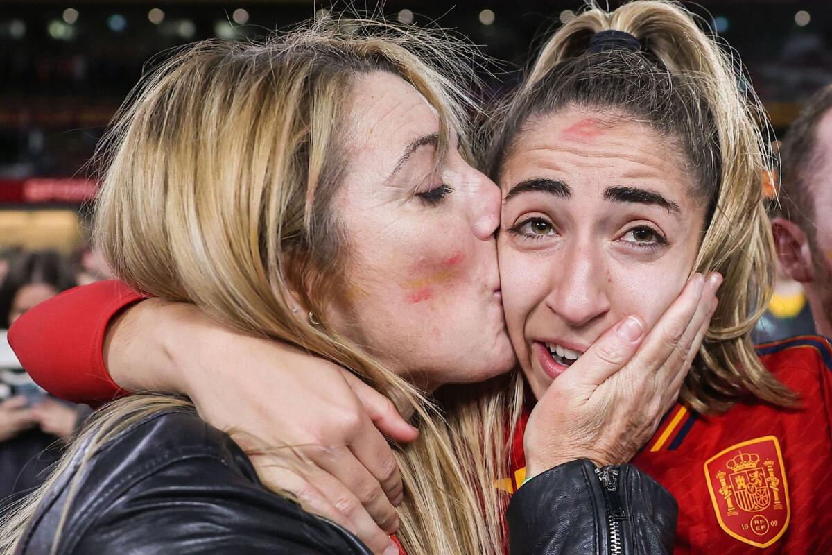 Spain's defender Olga Carmona (right) reacts after her team's win in the final. — AFP