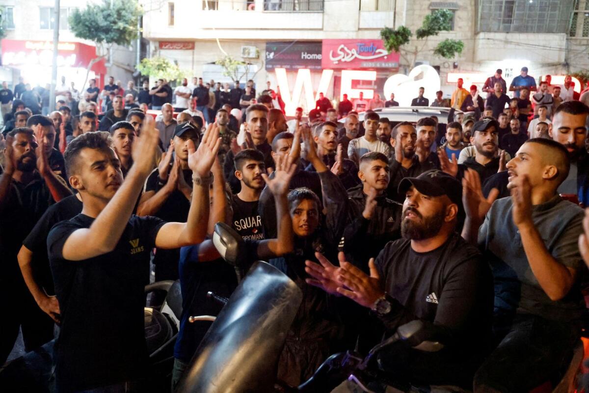 Palestinians take part in a protest after hundreds of Palestinians were killed in a blast at Al-Ahli hospital in Gaza that Israeli and Palestinian officials blamed on each other, in Tubas, in the Israeli-occupied West Bank October 17, 2023. Photo: Reuters