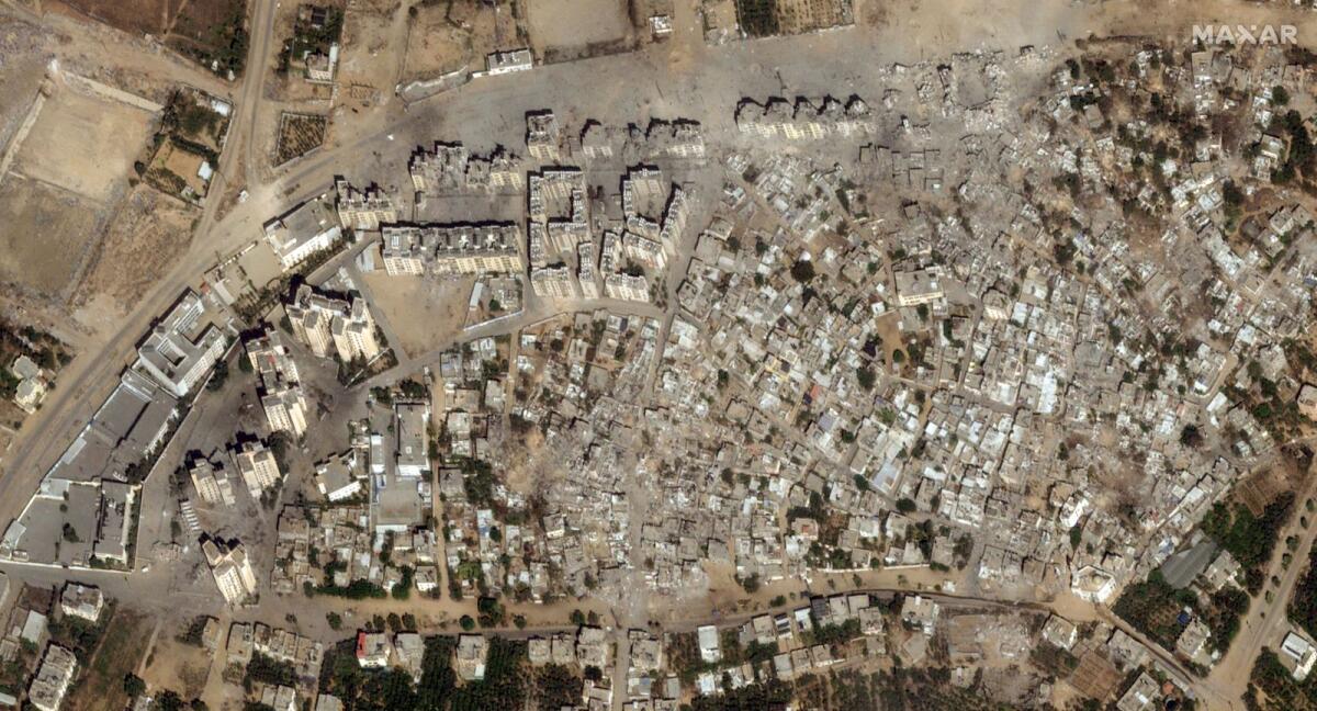 This image provided by Maxar Technologies shows after bombing damage in the Izbat Beit Hanoun neighbourhood in northern Gaza, on October 21, 2023. — AP