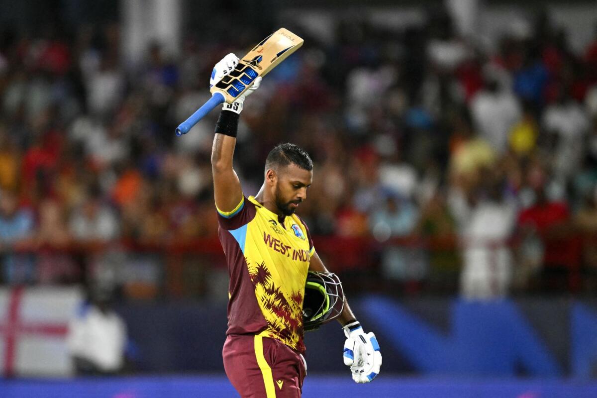 West Indies' Nicholas Pooran acknowledges the crowd after his stunning knock of 98 against Afghanistan. — AFP