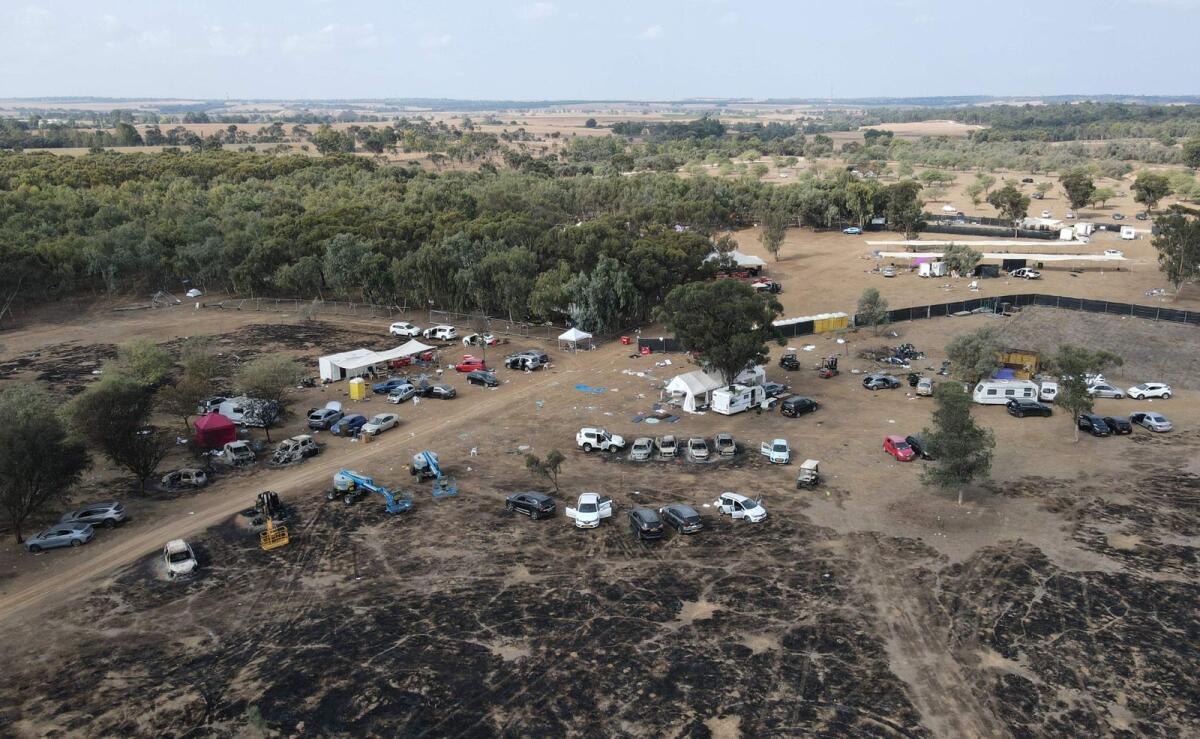 An aerial picture shows the site of the weekend attack on the Supernova desert music Festival by Palestinian militants near Kibbutz Reim in the Negev desert in southern Israel on Tuesday. — AFP