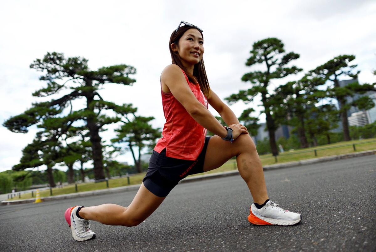 Tomomi Bitoh, 33, Japan's top ultra runner, during a workout session around the Imperial Palace in Tokyo on June 4, 2024.  — Reuters photos