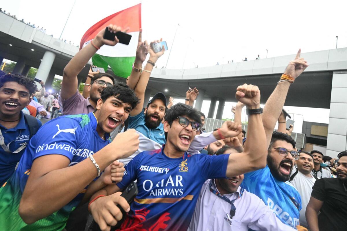 Indian cricket fans cheers at the arrival of Indian cricket team aat the Indira Gandhi international airport, after winning the T20 cricket World Cup, in New Delhi on July 4, 2024. Photo: AFP