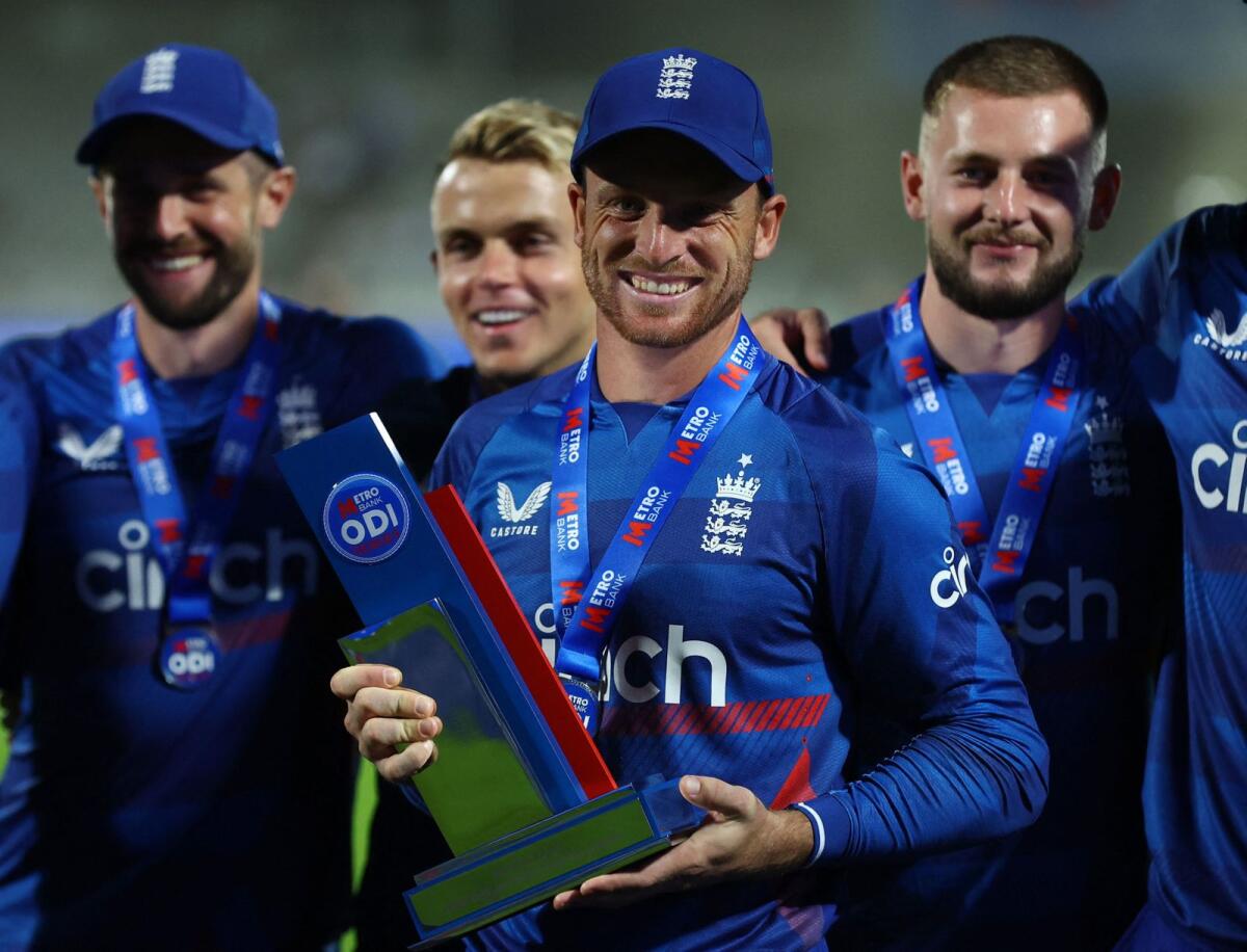 England captain Jos Buttler (centre). — Reuters