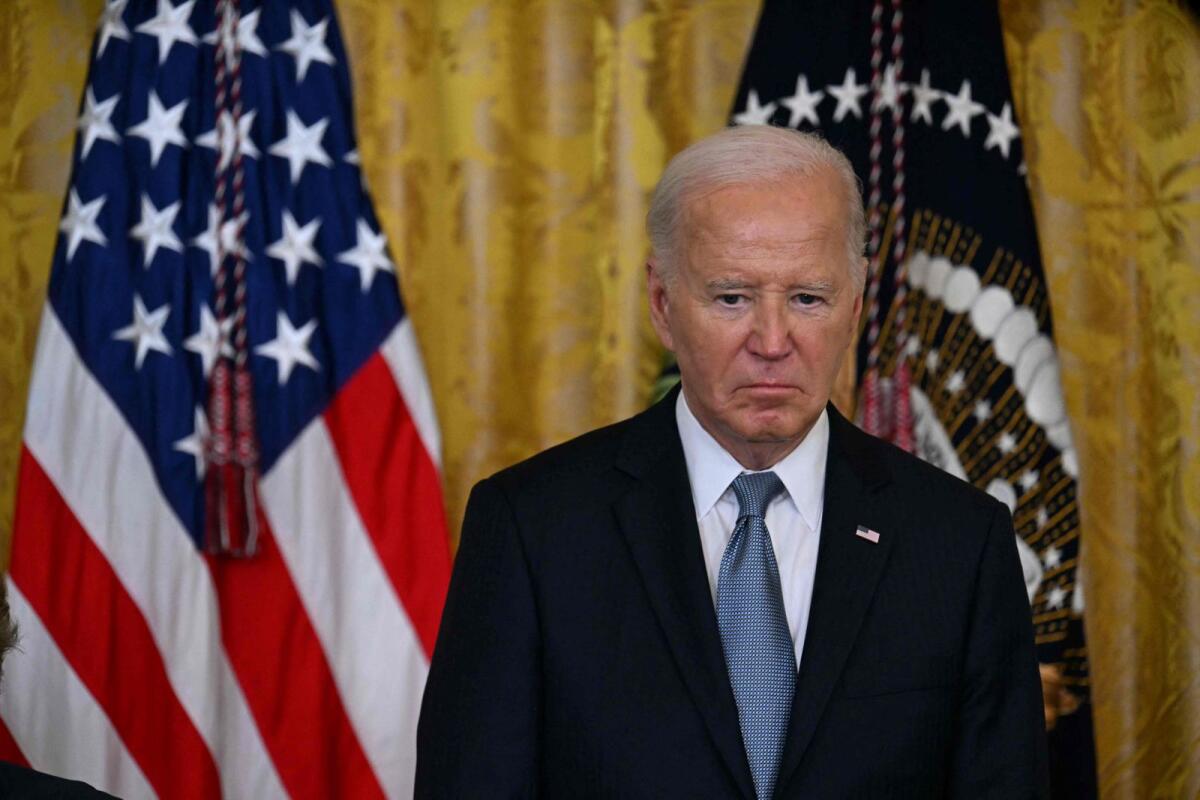 US President Joe Biden looks on during a Medal of Honor ceremony in the East Room of the White House in Washington, DC, on July 3, 2024. — AFP